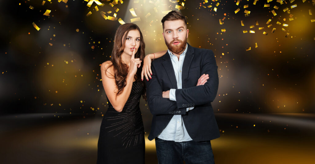 Gala attendees sharing a private moment, symbolizing intentional planning for a successful nonprofit fundraising gala