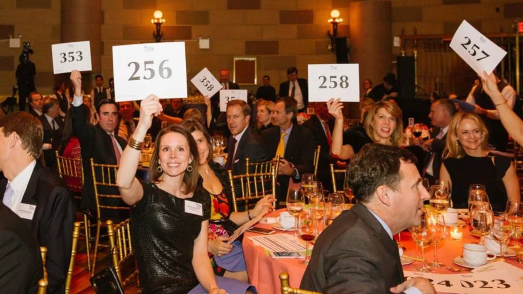 A donor participating in a fundraising moment, symbolizing how generosity supports both personal well-being and nonprofit missions